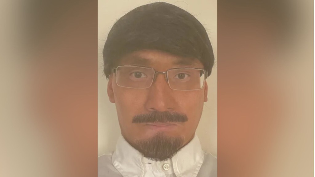 Thomas Kwan po zamaskovaní.