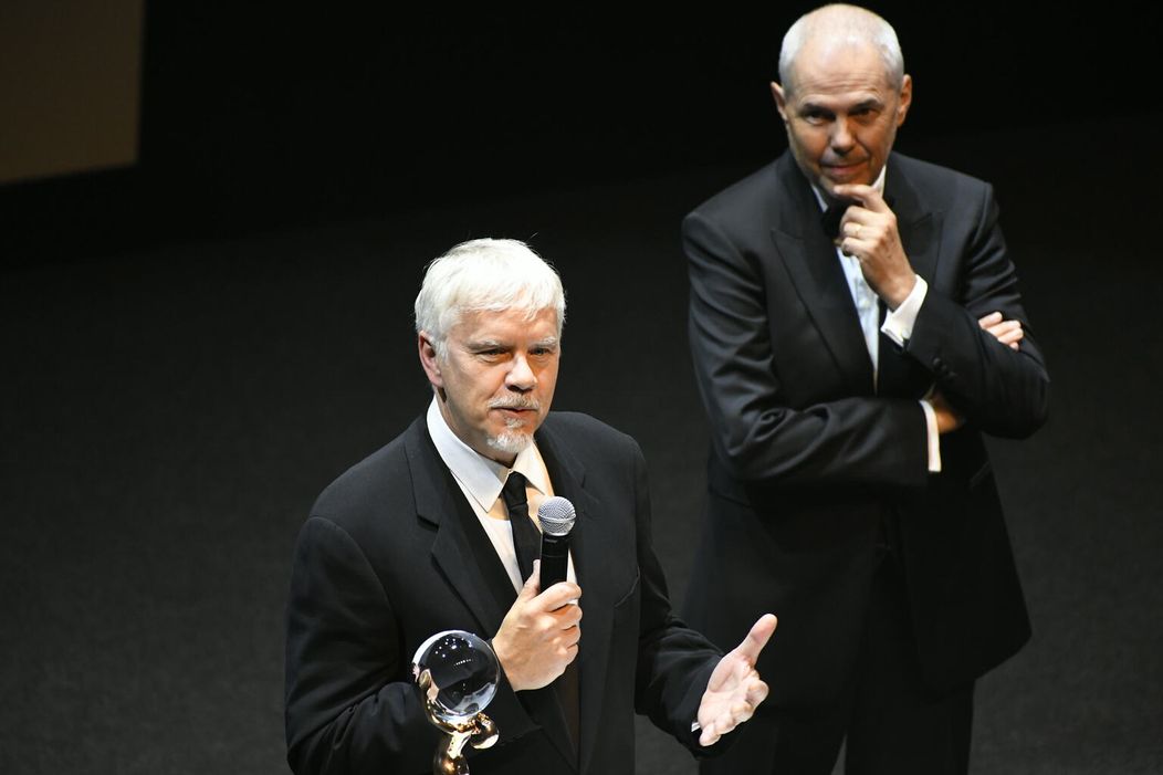 Herec Tim Robbins a moderátor Marek Eben