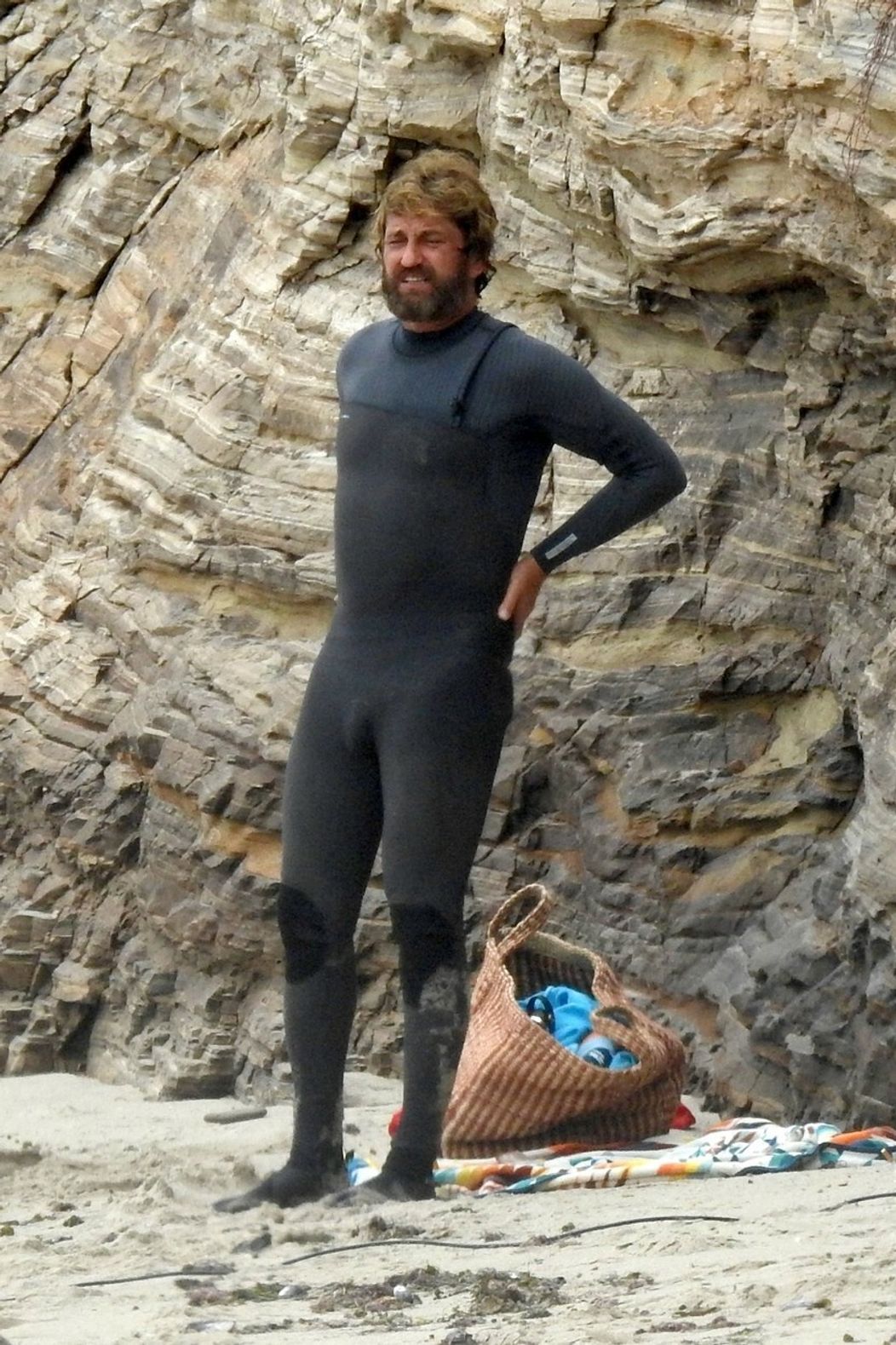 Gerard Butler na pláži v Malibu