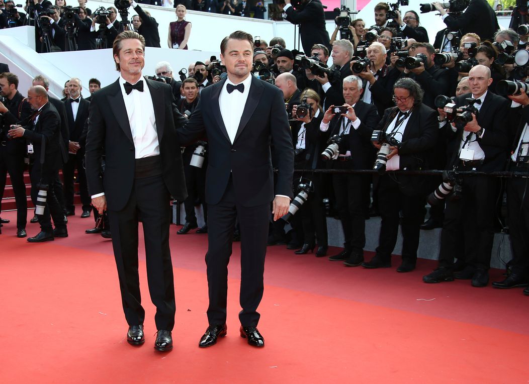 Brad Pitt, Leonardo DiCaprio, Quentin Tarantino a Margot Robbie.