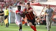 Vpravo hráč Trnavy Adrian Zeljkovič a Trenčan Emmanuel Uchegbu bojujú o loptu v 1. kole Niké ligy.