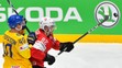 Zľava Mattias Ekholm zo Švédska a Švajčiar Roman Josi v zápase na MS 2019.