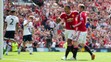 Wayne Rooney a Memphis Depay oslavujú vlastný gól Kylea Walkera (Tottenham) v prvom zápase nového ročníka Premier League.