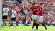 Wayne Rooney a Memphis Depay oslavujú vlastný gól Kylea Walkera (Tottenham) v prvom zápase nového ročníka Premier League.