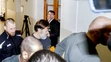 Dušan Dědeček prichádza v sprievode členov Zboru väzenskej a justičnej stráže prichádza do súdnej siene na Okresnom súde Bratislava I v stredu 25. januára 2023.