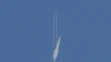 Raketoplán Virgin Galactic s Richardom Bransonom na palube sa odpútal od materskej lode.