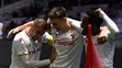 Zľava Filip Bainovič, Dominik Hollý a Eynel Domingos (všetci Trenčín) oslavujú gól v zápase 13. kola Fortuna ligy proti Slovanu.