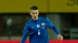 Slovenský reprezentačný stredopoliar Ján Greguš počas prípravného duelu na pôde Rakúska.