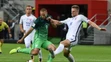 Na snímke vpravo hráč Slovenska Milan Škriniar a hráč Slovinska Tim Matavž v zápase kvalifikácie MS.