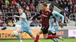 Zľava hráč Slovana Lucas Lovat, hráč Spartaka Milan Ristovski a hráč Slovana Myenty Abena počas zápasu 11. kola Fortuna ligy.