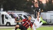 Zľava Dmitris Goutas (Atromitos) a vpravo Eric Ramirez z Dunajskej Stredy v 2. predkole EL.