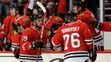 Hráč Chicago Blackhawks Chris DeSousa (59) a Ľubomír Višňovský na kempe klubu.
