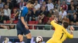 Michal Ďuriš (Slovensko) a vpravo brankár Christoffer Haagh (Dánsko).