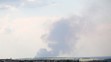 Na snímke z konca júna vidno dym po ostreľovaní ukrajinského mesta Lyman.