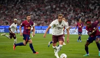Premiéra Kanea za Bayern mala trpkú príchuť. Superpohár pre Lipsko hetrikom zariadil Olmo