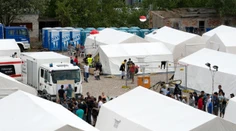 V utečeneckom tábore sa pobilo asi 100 utečencov zo Sýrie a Afganistanu