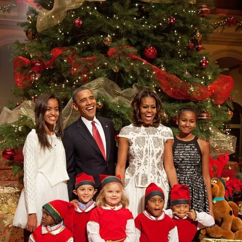Barack Obama so svojou manželkou Michelle a dcérami Maliou a Sashou