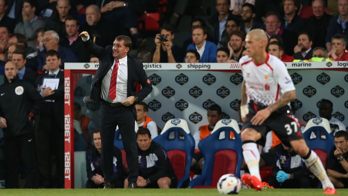 Futbalista Liverpoolu Slovák Martin Škrtel (vpravo) a bývalý tréner Brendan Rogers