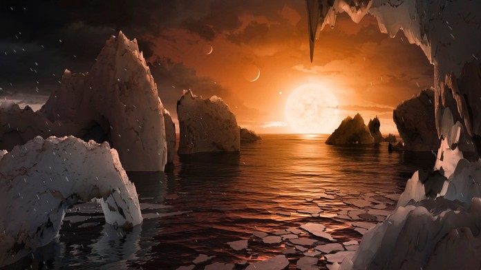 Na umeleckej snímke predstava, ako by mohol vyzerať povrch planéty TRAPPIST-1f.