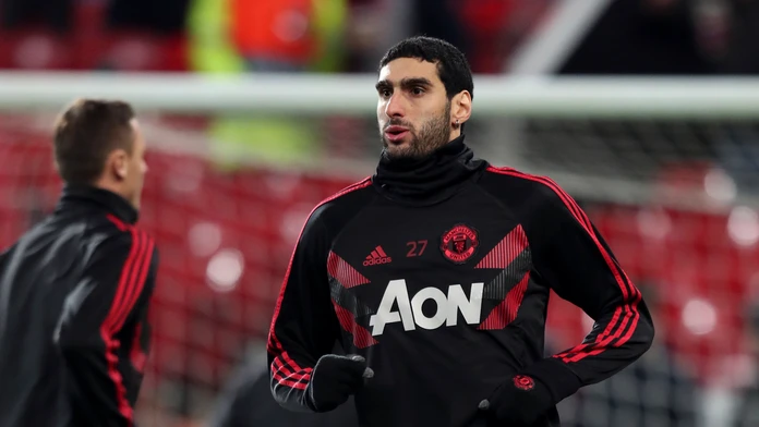 Marouane Fellaini z Manchesteru United na rozcvičke pred zápasom LM proti Bernu.