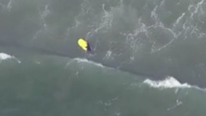 Body-boarder-comes-dangerously-close-to-a-great-white-shark.jpg