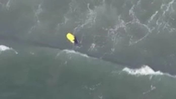 Body-boarder-comes-dangerously-close-to-a-great-white-shark.jpg