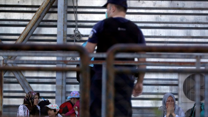 Migranti v Grécku.