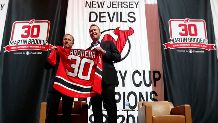 Spolumajiteľ New Jersey Devils Josh Harris a brankár Martin Brodeur.