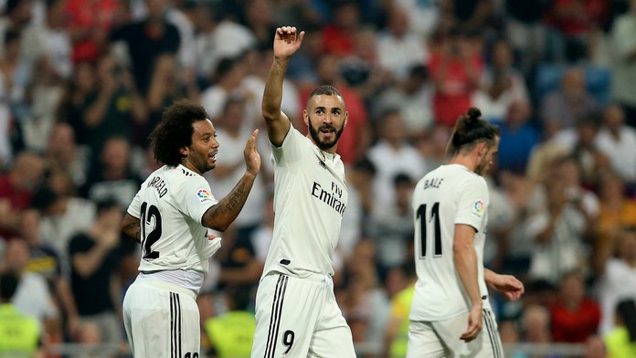 Benzema oslavuje svoj druhý gól proti Leganes.