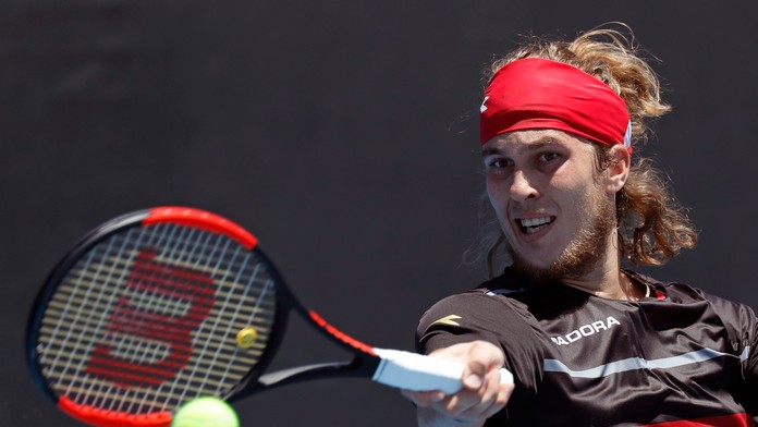 Slovenský tenista Lukáš Lacko v dueli 2. kola Australian Open proti Dudovi Selovi.