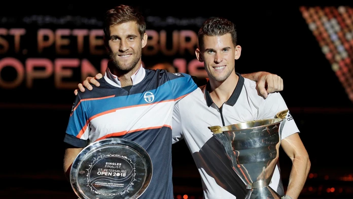 Porazený finalista slovenský tenista Martin Kližan a víťaz turnaja v Petrohrade Domic Thiem.