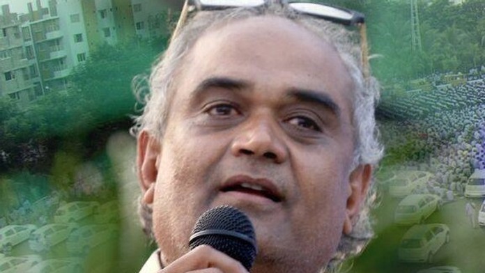 Savji Dholakia.
