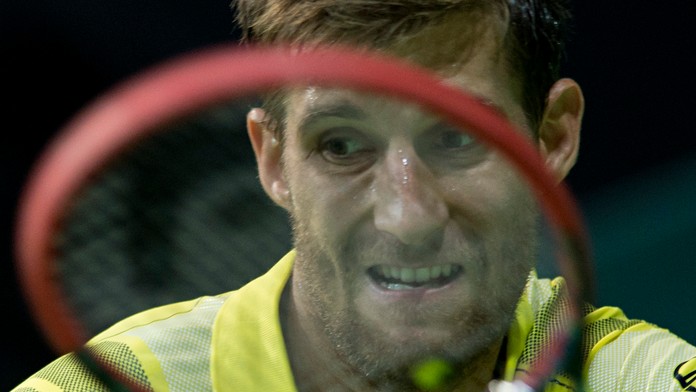 Martin Kližan v daviscupovom zápase proti Poliakovi Jerzymu Janowiczovi.