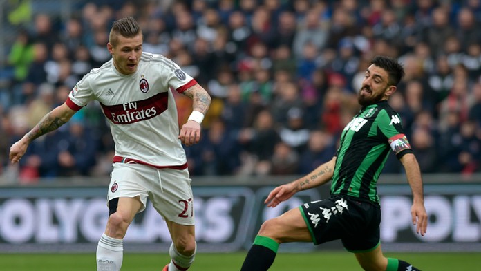 Reprezentačný stredopoliar a hráč AC Miláno Juraj Kucka, vpravo hráč Sassuola Francresco Magnanelli.