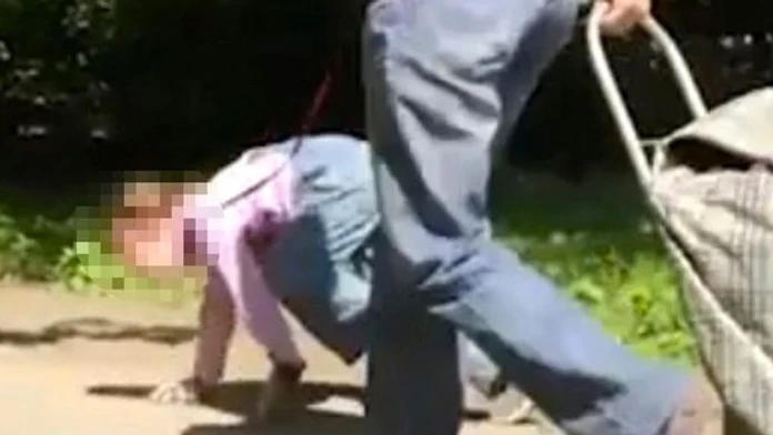Woman-crawling-on-leash (1).jpg