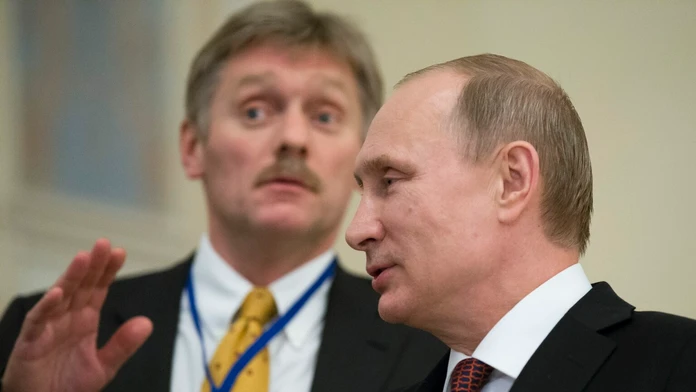 Vladimir Putin a Dmitrij Peskov