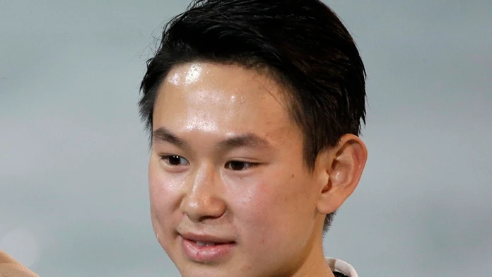 Bronzový medailista z olympiády zo Soči Denis Ten na archívnej snímke.