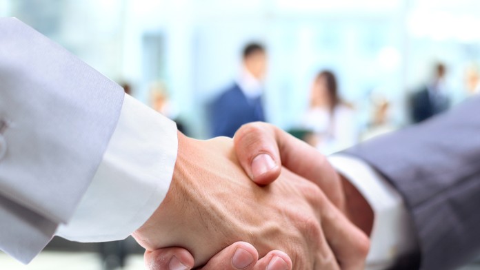 Podanie rúk - ilustračná foto 