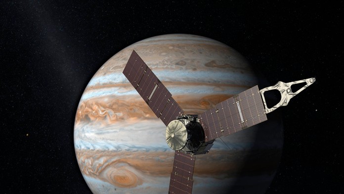 Na umeleckej snímke americká družica Juno nad planétou Jupiter.