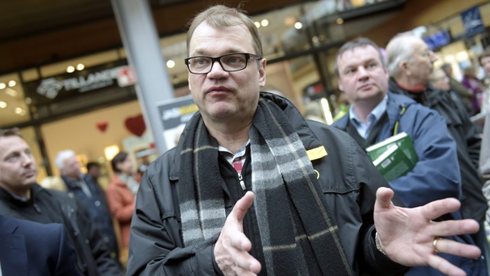 Šéf opozičnej Strany stredu, veľkopodnikateľ Juha Sipilä.
