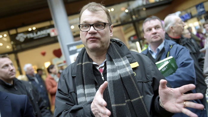 Šéf opozičnej Strany stredu, veľkopodnikateľ Juha Sipilä.