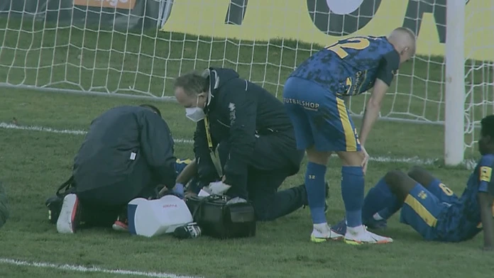 Zranený futbalista.