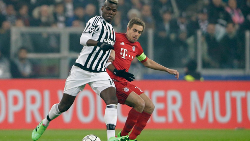 Vľavo Paul Pogba (Juventus) a Philipp Lahm (Bayern) v osemfinále LM.