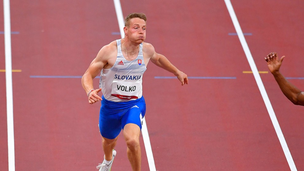 Ján Volko počas rozbehu na 100 metrov na OH.