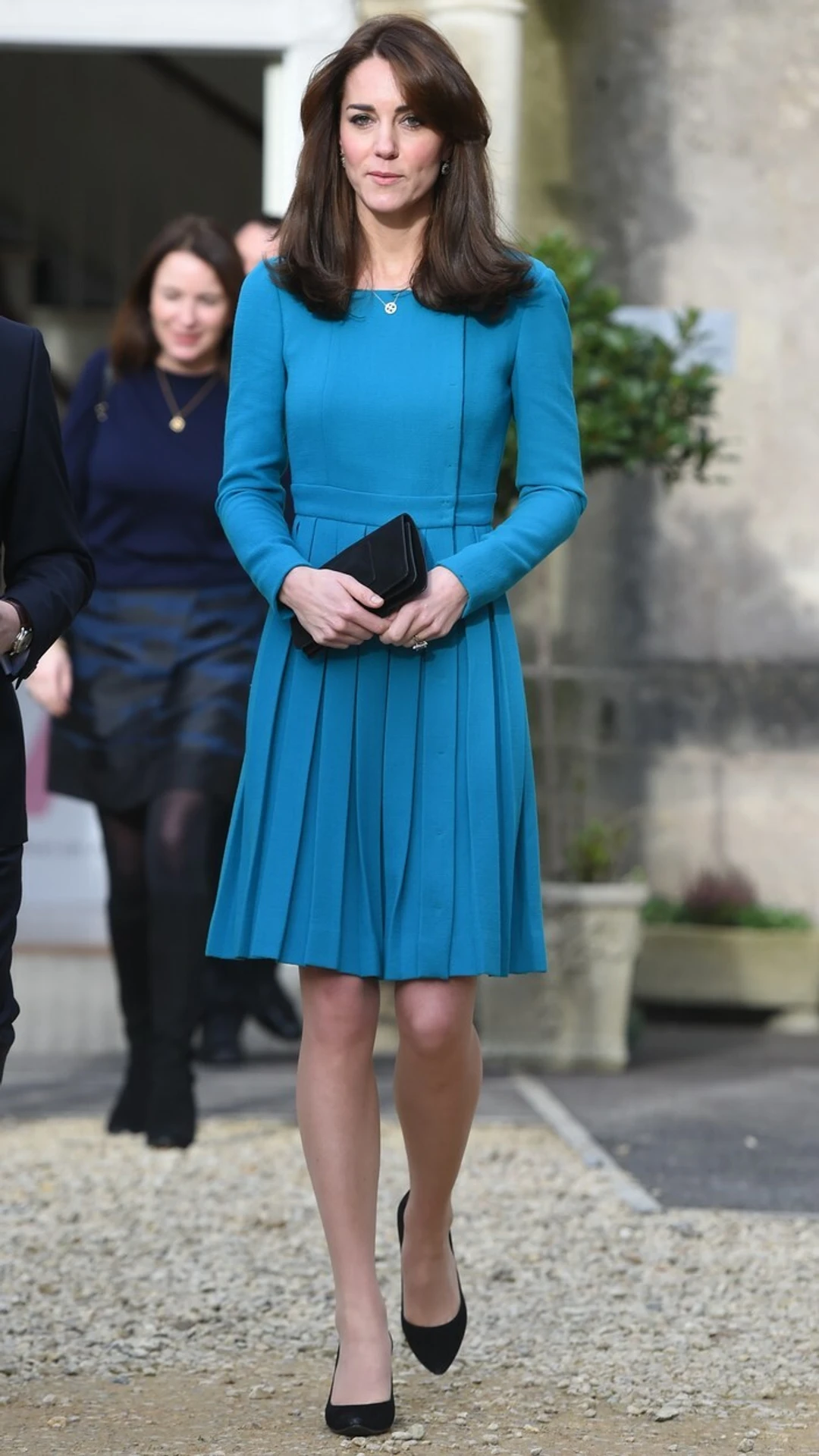 Kate Middleton v tyrkysových šatách.